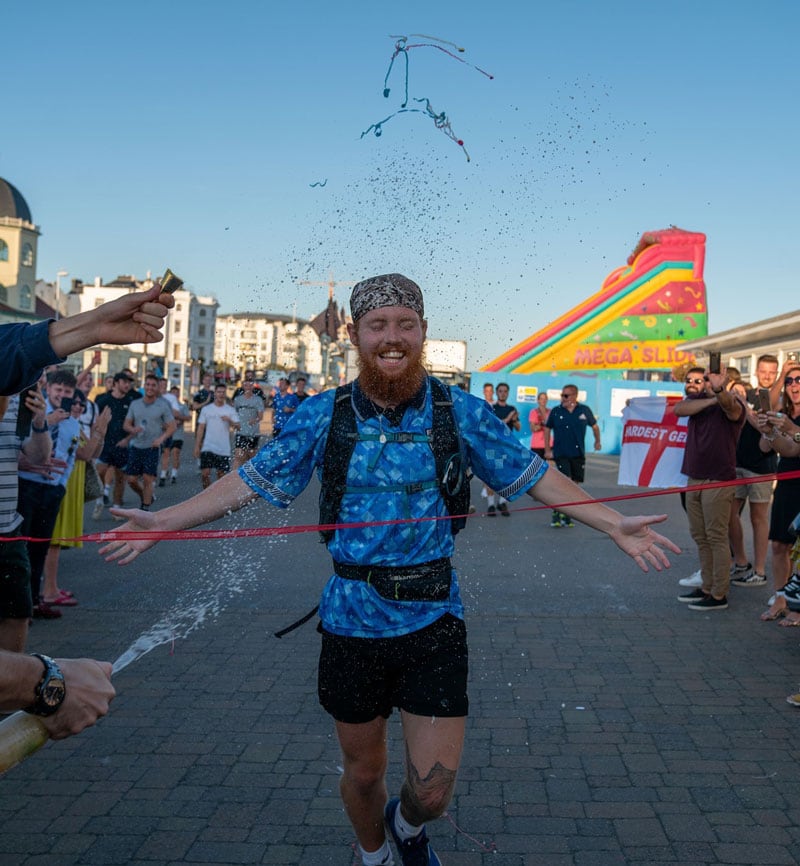 Coach at the finish line during a race.